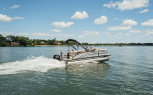 A beautifully designed Harris Sunliner 210 SL pontoon boat on the water, showcasing elegance and performance.